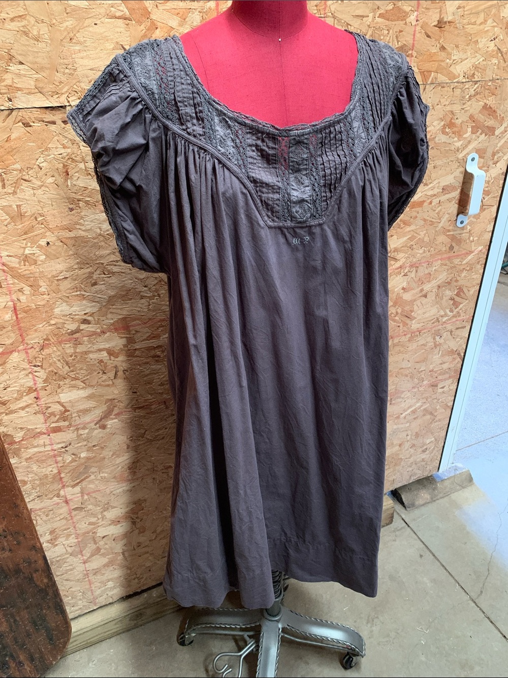 Magnolia Pearl Cotton smocked lace scoop neckline dress.